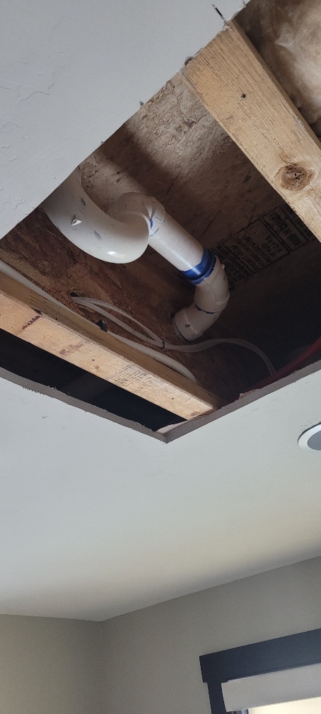 Fixing water damage to the ceiling from a leaking shower